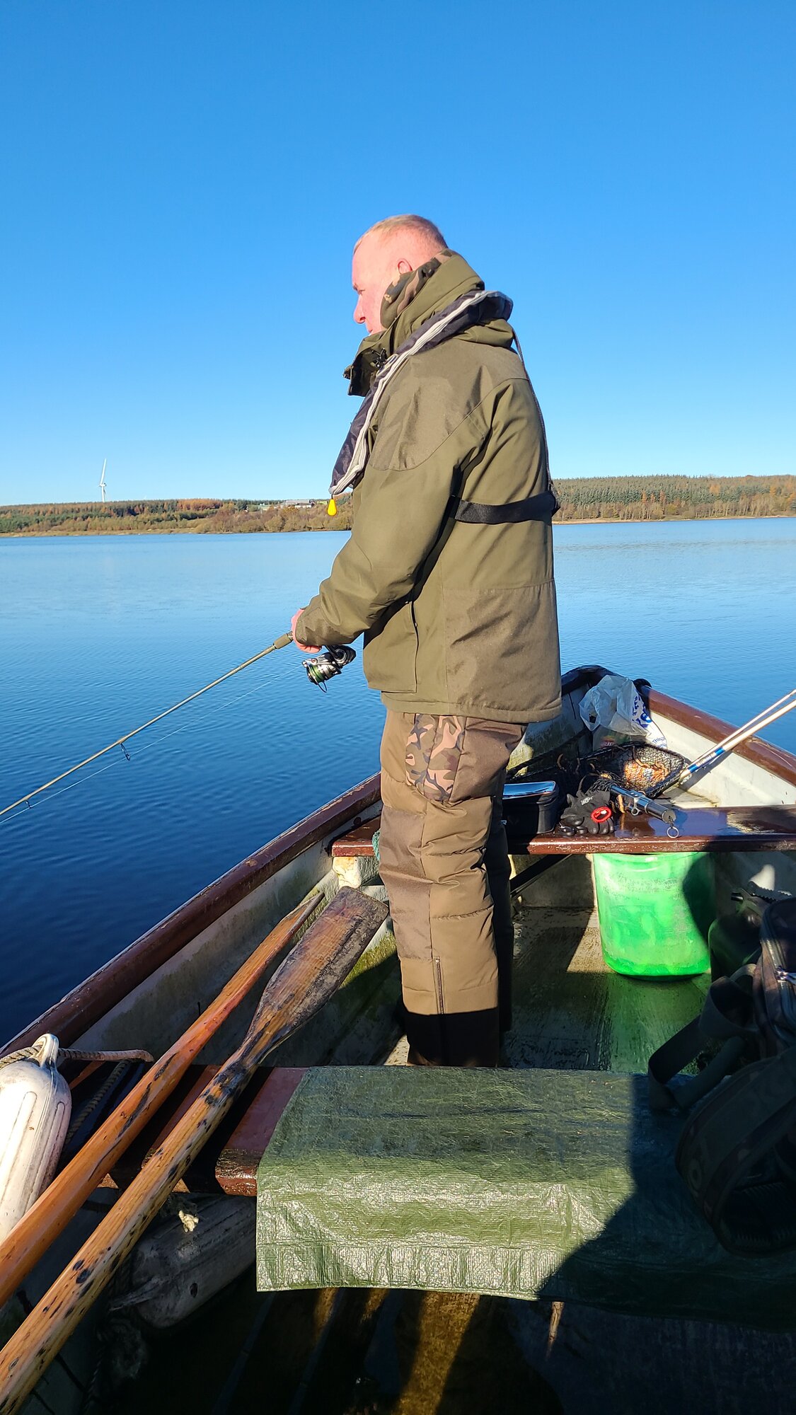 Fishing from a boat at Hillend Loch